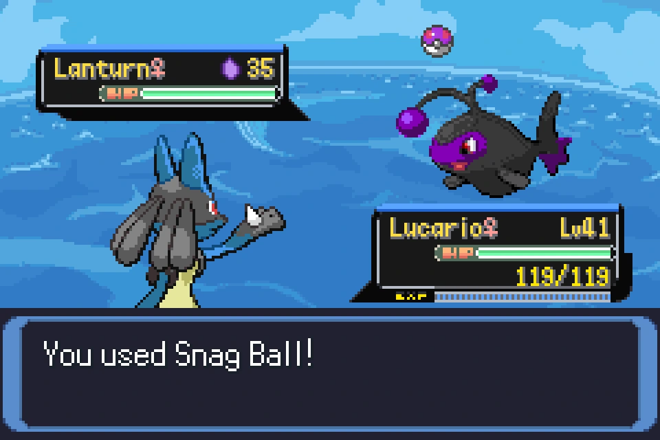An underwater battle against a shadow Lanturn, with the message "You used Snag Ball!"